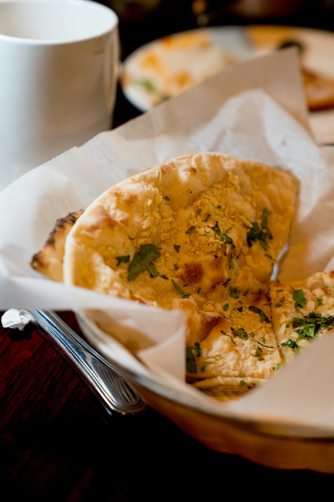 Warm naan bread with herbs